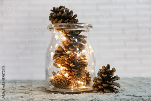 Jar with pine cones and Chr...