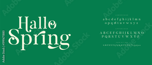 A green background with the words Hallo Spring and an alphabet in white text
