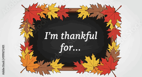 Chalkboard framed by colorful autumn leaves with "I'm thankful for..." text