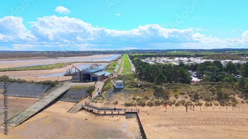 Wells Next to the Sea Beach. Sand dunes where Norfolk Coast path with beach huts and tourist beaches. Beach huts on the promenade at Gorleston-on-sea in Norfolk, UK