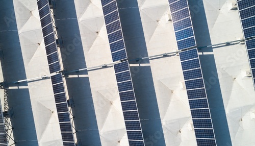 Aerial View of Solar Panels on Roofs from Drone Perspective