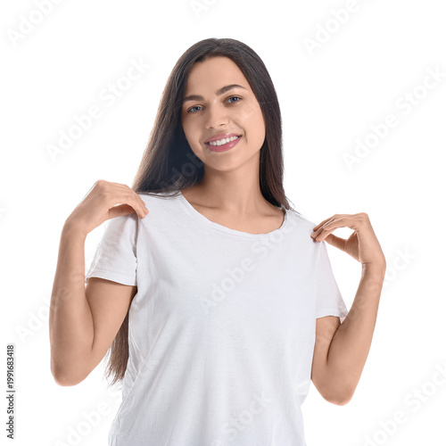 Young brunette woman on whi...