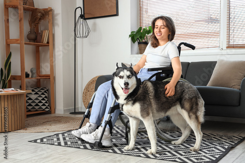 Young woman in wheelchair a...