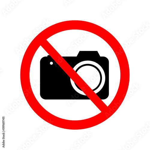 Prohibited camera icon for no photo areas.