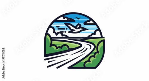 A bird soars over a winding road through green hills and a cloudy sky