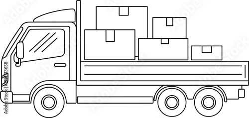 Flatbed truck carrying cardboard boxes during daytime delivery