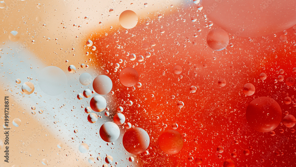 Obraz premium Oil bubbles creating vibrant abstract liquid background