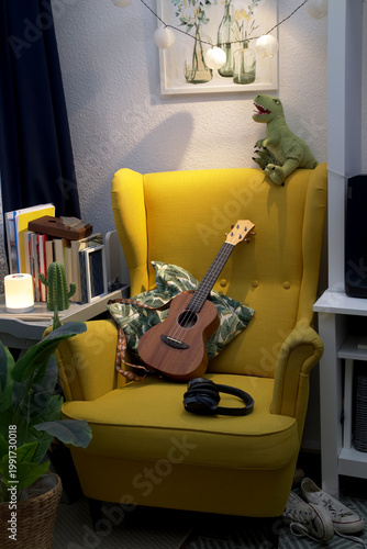 Cozy Reading Nook with Yellow Armchair and Ukulele