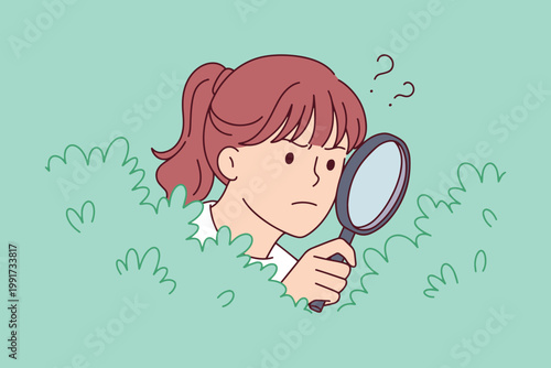 Girl using a magnifying glass to look through bushes. Concept of biological research, nature study, spying, or private investigation.