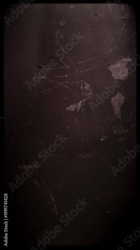 Flickering noisy grunge style film effect overlay loop.
