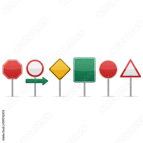 A collection of various road signs on poles in a straight line outdoors