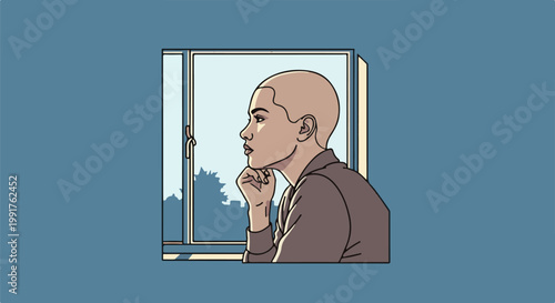 A person with a shaved head looks out a window, resting their chin on their hand
