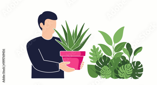 A person holds a potted plant next to a lush collection of various green leaves