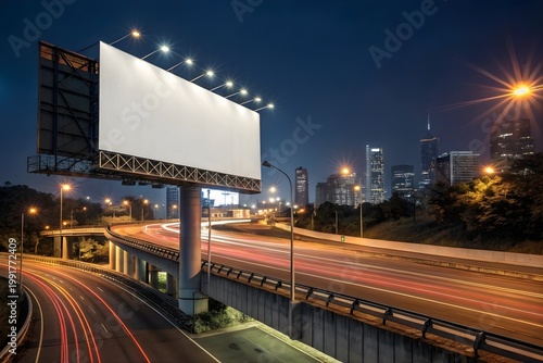 Horizontal empty outdoor billboard on highway at night for advertisement presentation.
