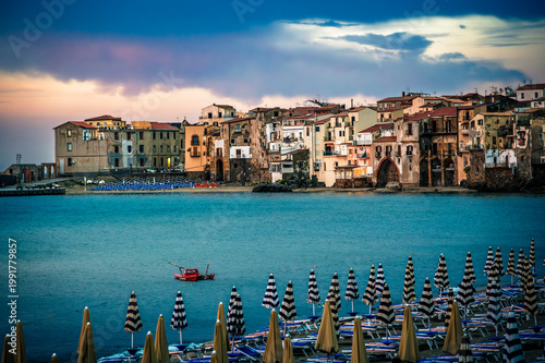 A magical summer holiday in Sicily. Cefalù, and its ancient town at sunset.