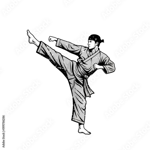 Martial artist performing a high side kick in a traditional gi