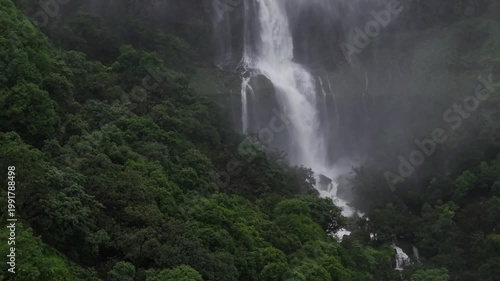 Moving Drone shot of a Huge explosive waterfall shot during heavy monsoon. Three tier waterfall. Tallest waterfall in India. Drone clip 4K60