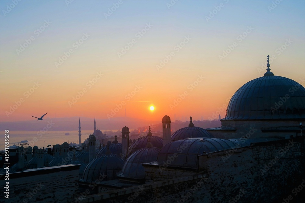 Obraz premium Sunset Serenity Over Istanbul’s Historic Domes