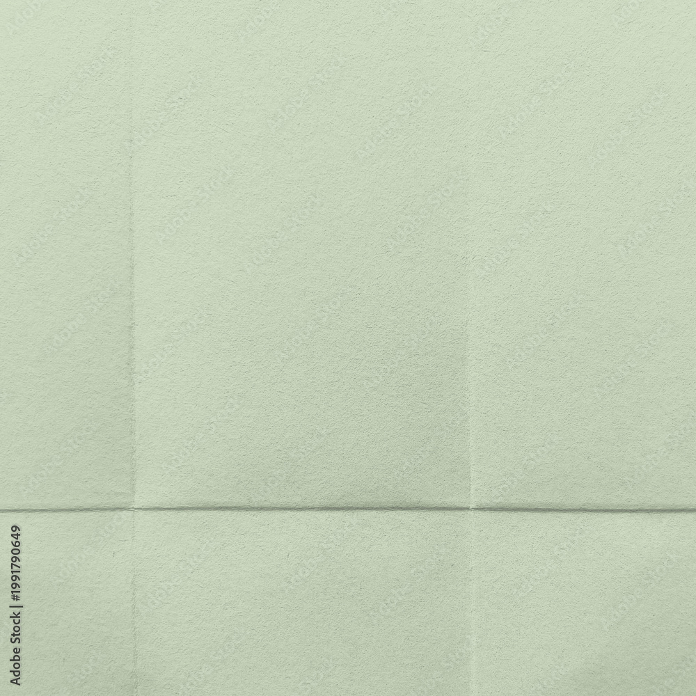 Fototapeta premium Textured pale green paper background