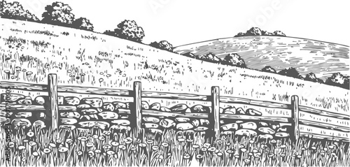 Rustic countryside landscape with wooden fence, stone wall, grassy meadow and rolling hills