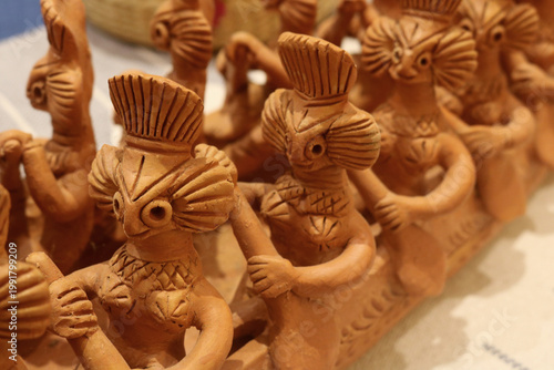 Closeup image of Hatima Putul terracotta doll of Assam, India.	