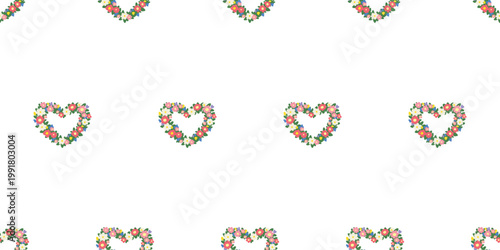 Selective focus. Seamless pattern with heart shaped floral wreath