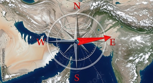 Satellite view of middle east and north africa with compass overlay, red arrow pointing east