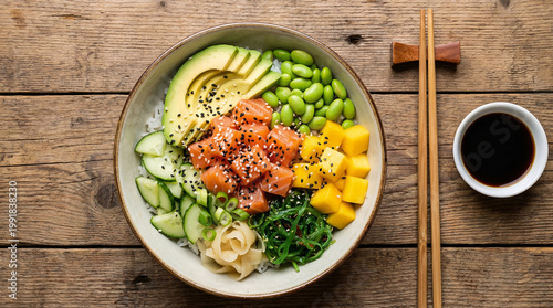 Salmon poke bowl avocado mango cucumber edamame rice sesame seed design seaweed salad and salmon poke bowl with avocado mango cucumber edamame