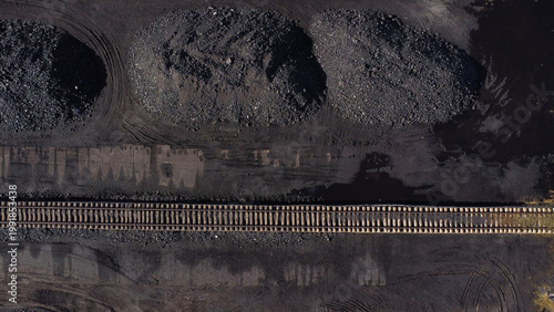 Aerial View of Industrial Railway and Coal Piles at Mining Facility