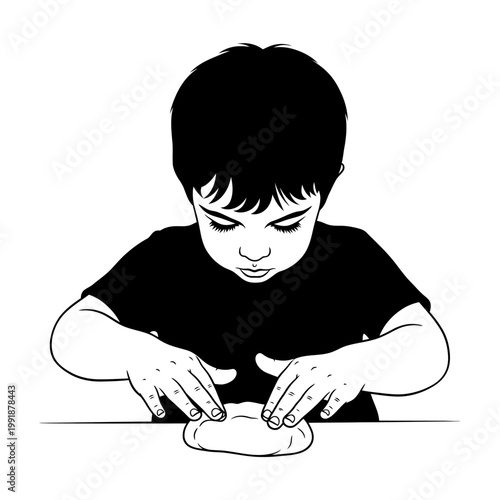 Boy playing with modeling clay.