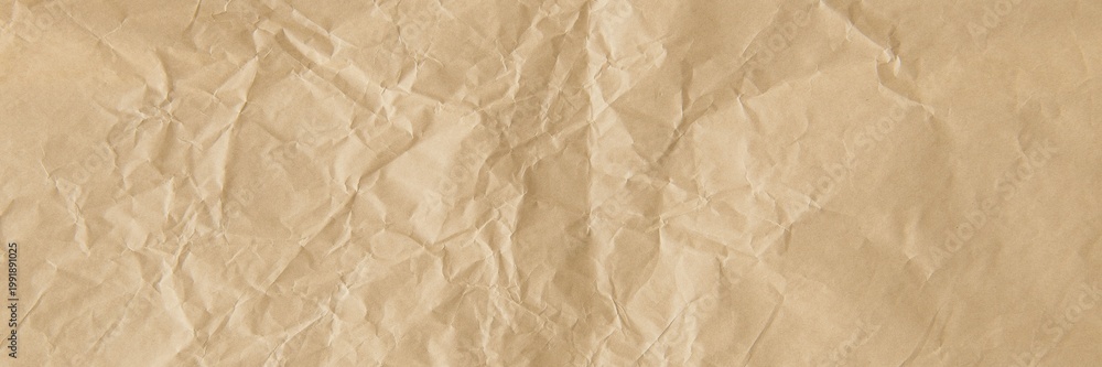 Fototapeta premium Brown crumpled paper background