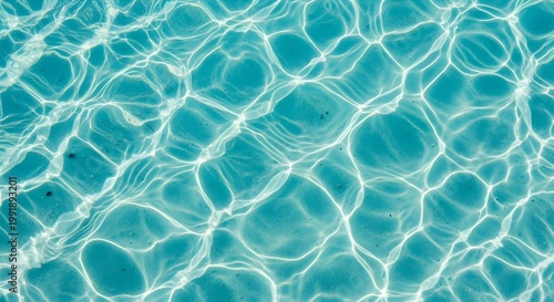 top view of clean, clear, blue water ripples seamless background texture crystal-clear tropical ocean water