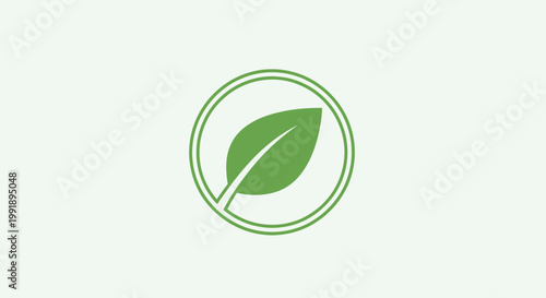 Green leaf inside double circle icon symbolizing nature and eco-friendliness