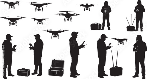 Silhouettes of people operating drones and equipment outdoors