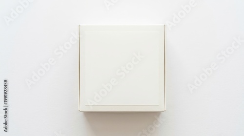 Minimal white square gift box mockup top view flat lay