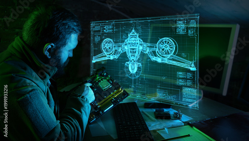 Fotografía Engineer repairing motherboard while analyzing military aircraft blueprint hologram