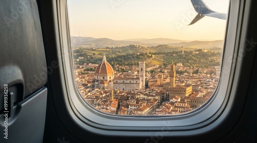 Aerial view of Florence skyline at sunset through airplane window with flying bird