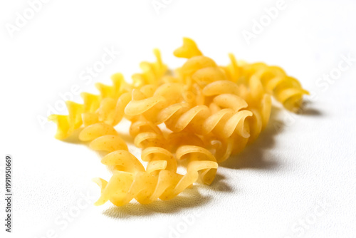 fusilli pasta isolated on white background