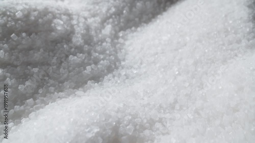 Sugar hills. Camera slide over sugar mountains. Grains of natural sugar. Slider shot with macro probe lens. 4K, UHD