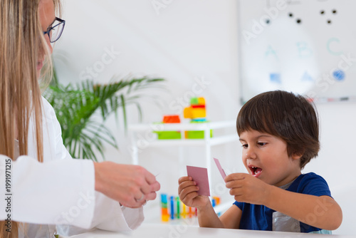 Child psychology, toddler doing logic tests with cards