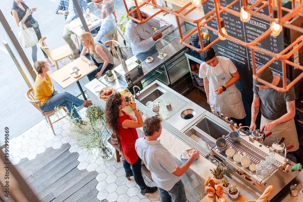 Obraz premium Bustling cafe with diverse patrons
