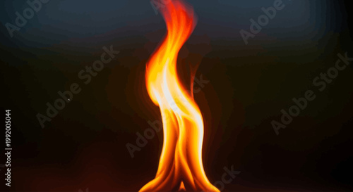 Vibrant orange and yellow flame burning brightly in darkness.