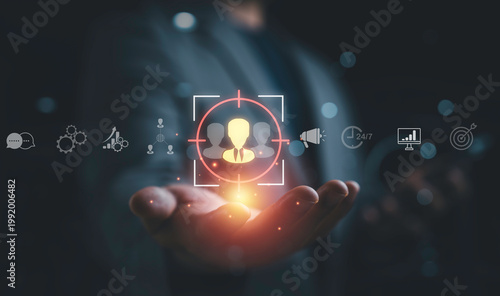 Foto Customer focus concept with target audience icon in hand, symbol client centric strategy, user engagement, marketing analytics, customer experience and personalized service for business growth