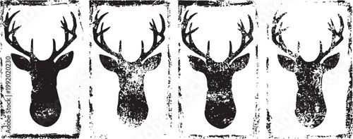 Monochrome grunge deer head silhouettes set on white background in vintage