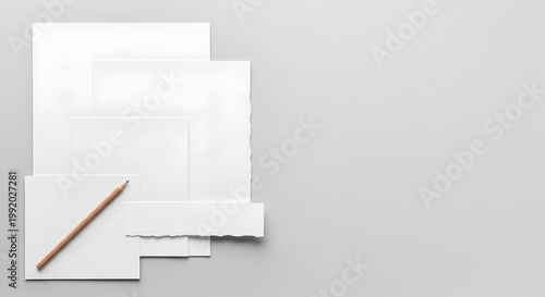 Blank White Paper Stack with Pencil on Gray Background