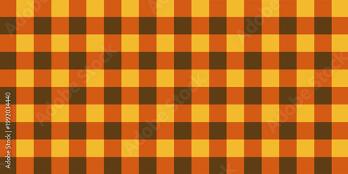 Checkered autumn picnic plaid texture. Gingham or vichy pattern. Thanksgiving Day or Halloween print. Tablecloth, blanket, napkin or towel textile design. Vectorillustration.