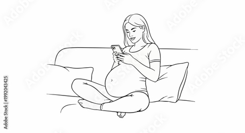 Pregnant woman relaxing on a couch, smiling while looking at her phone