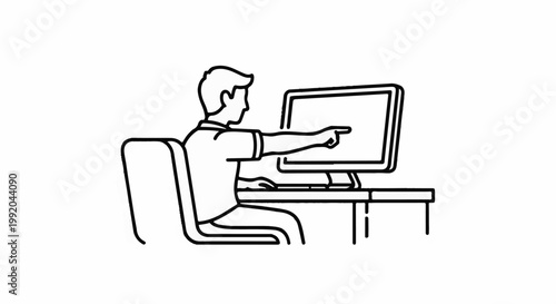 Person at desk pointing at computer screen with cursor