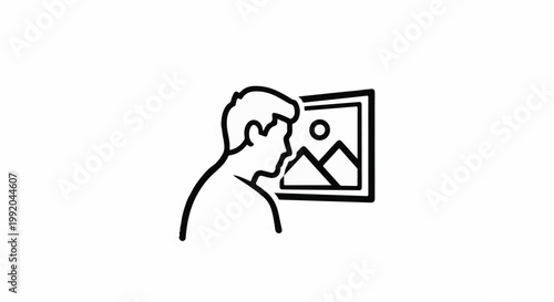 Person looking at a framed landscape picture