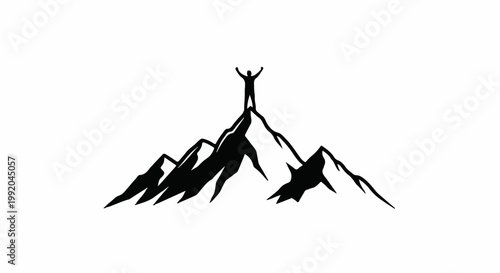 Silhouette of a person with arms raised in triumph on a mountain peak